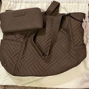 I am selling a Logan Tote with the matching Greige Wallet